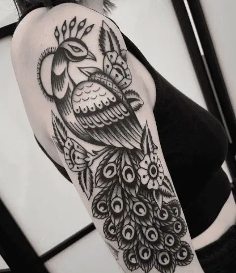 Greyscale Traditional Peacock Arm Tattoo