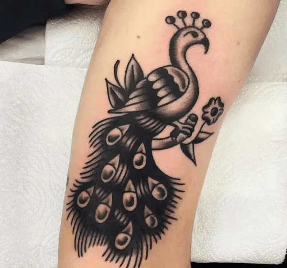 Black and Grey Traditional Peacock on the Branch Tattoo
