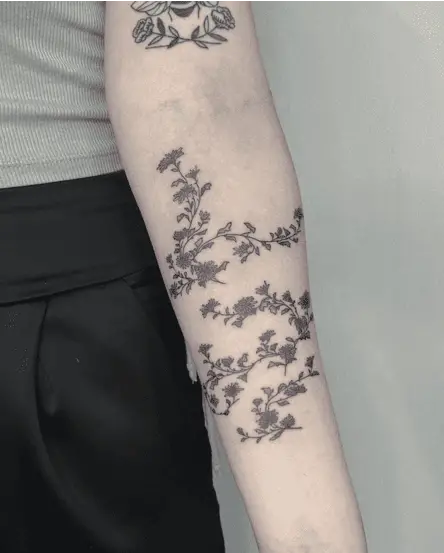 Black and Grey Wild Chrysanthemum Vine Flowers Arm Tattoo