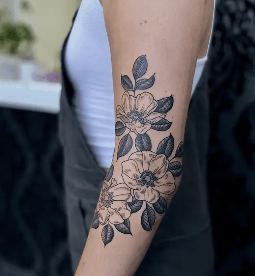 Line Work Wild Roses Arm Tattoo