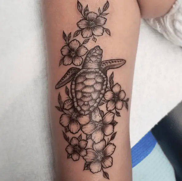 Greyish Sea Turtle with Flowers Tattoo