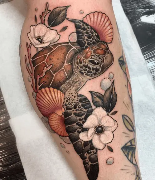 Sea Turtle with White Flowers and Sea Shells Tattoo