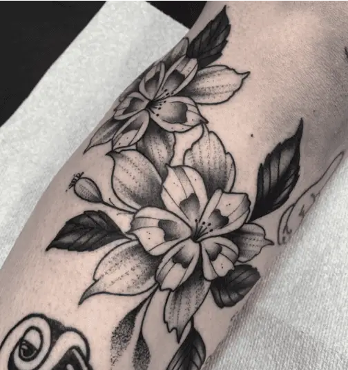 Black and Grey Two Columbine Flower Leg Tattoo