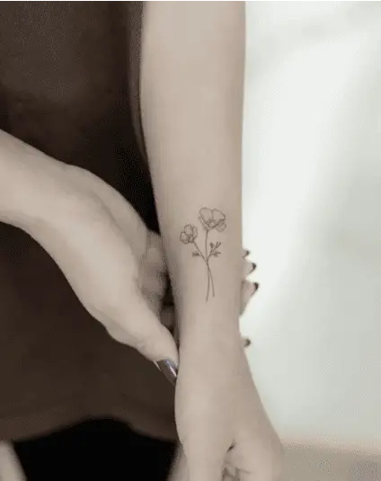 Simple Fine Line California Poppy Arm Tattoo