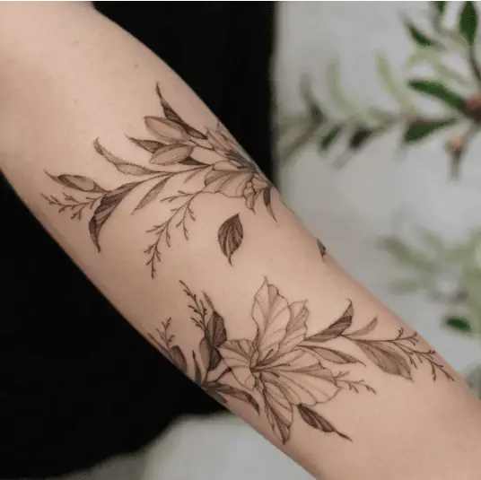 Black and Grey Lillies Wildflower Leaf Wrap Arm Tattoo