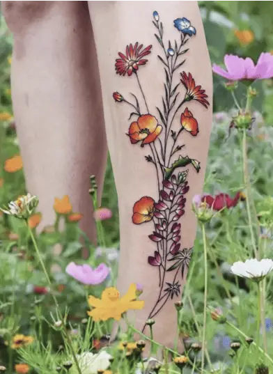 Bright Colored Mixed Wildflower Leg Tattoo