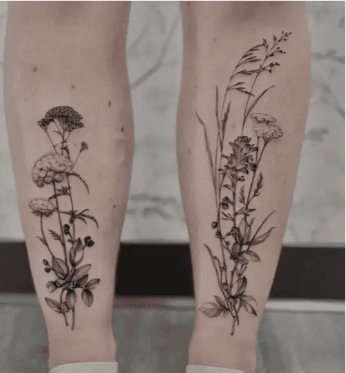 Black and Grey Realistic Mixed Wildflower on Both Legs Tattoo