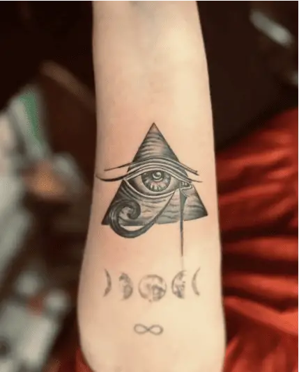 Black and Grey Eye of Horus Inside Triangle Pyramid Shape Arm Tattoo