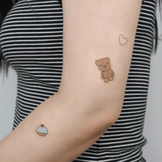 Brown Teddy Bear Arm Tattoo