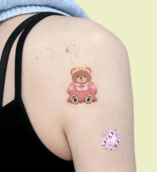 Brown Teddy with Pink Dress and Band Arm Tattoo