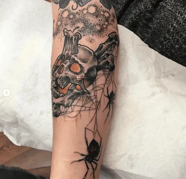 Spooky Skull and Spiders Leg Tattoo