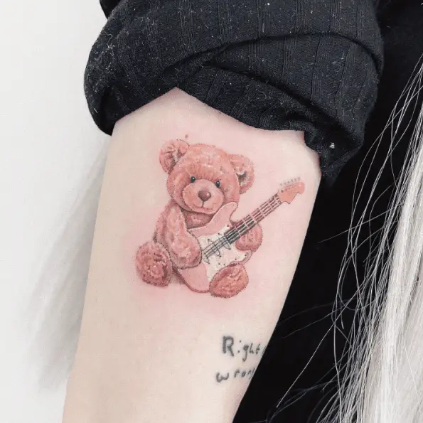 Teddy with Guitar Arm Tattoo