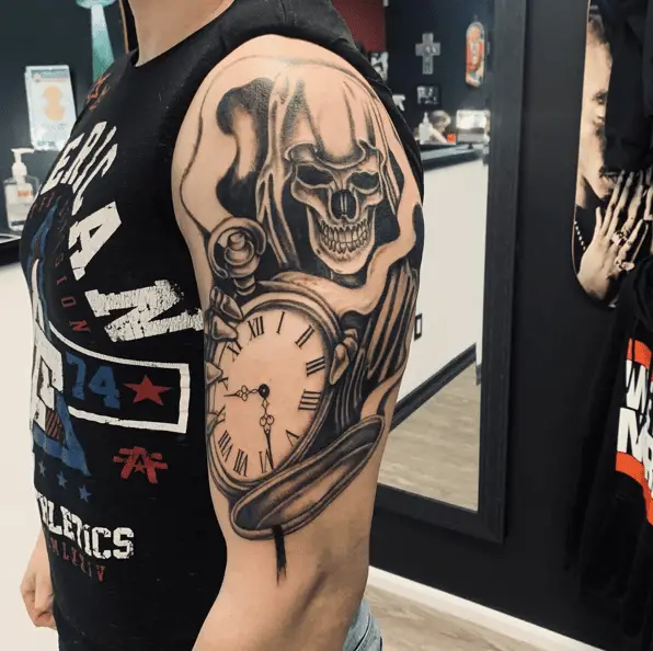 Grim Reaper Holding an Ancient Clock Tattoo