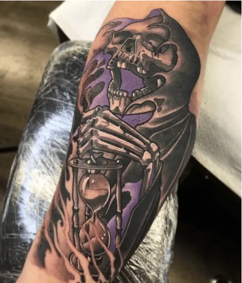 Violet Highlights Decaying Grim Reaper While Carrying an Hourglass Tattoo