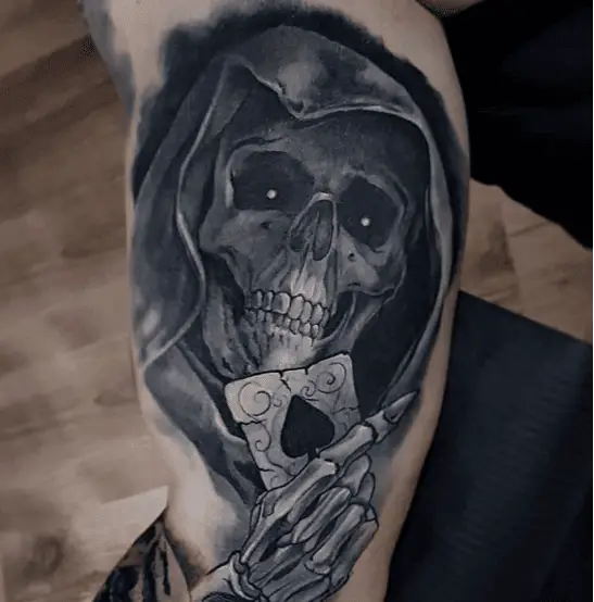 Grim Reaper Looking at the Ace of Spades Tattoo