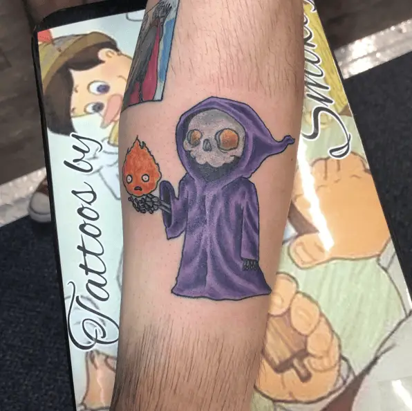 Little Grim Reaper Wearing Violet Cloak and Calcifer From the Studio Ghibli Tattoo