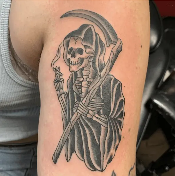 Smoking Grim Reaper While Holding his Scythe Tattoo