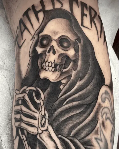 Santa Muerte With a Chain Black and Grey Tattoo 