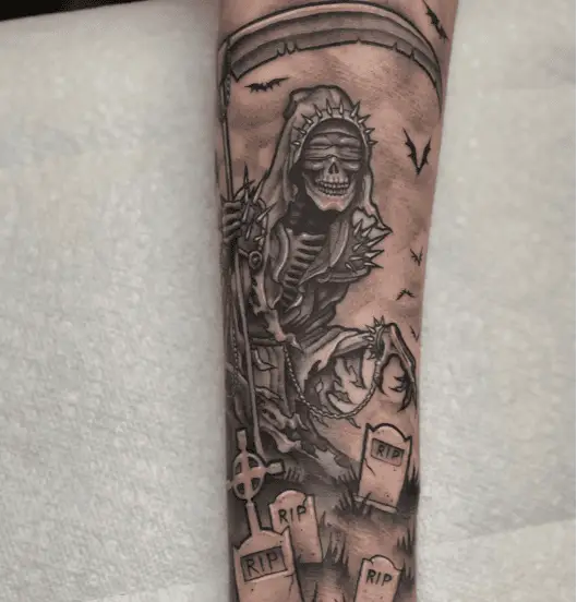 Blind Fold Grim Reaper Walking on a Graveyard Tattoo Tattoo