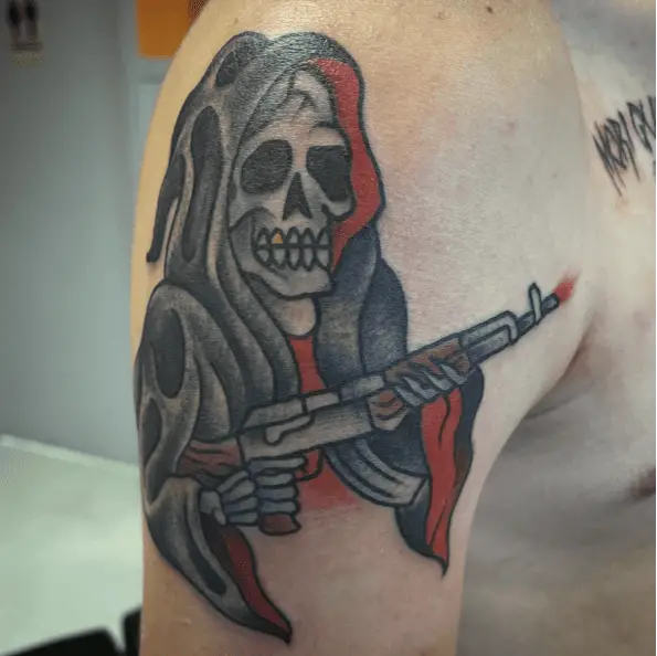 Gold Tooth Grim Reaper Firing a Gun Tattoo