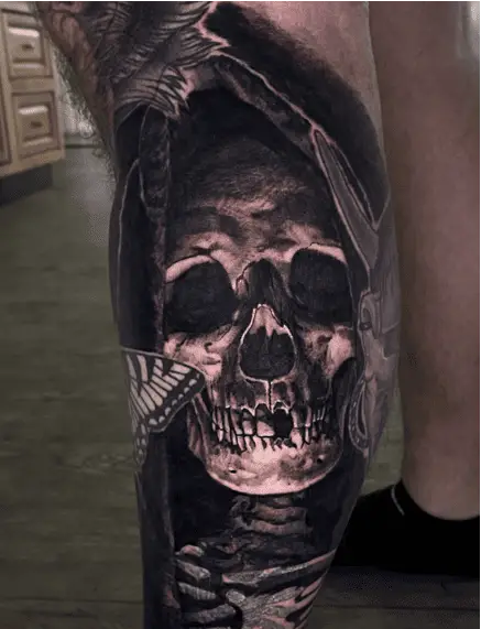 Grim Reaper Skull Light Shines From Below Tattoo
