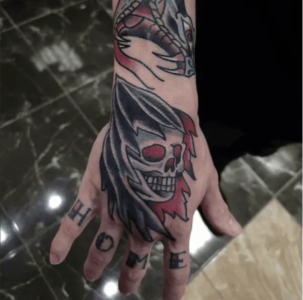 Grim Reaper Skull With Gold Tooth Tattoo