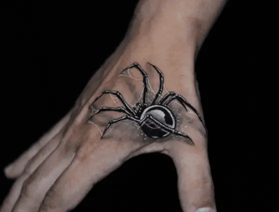 Black and White Spider Hand Tattoo