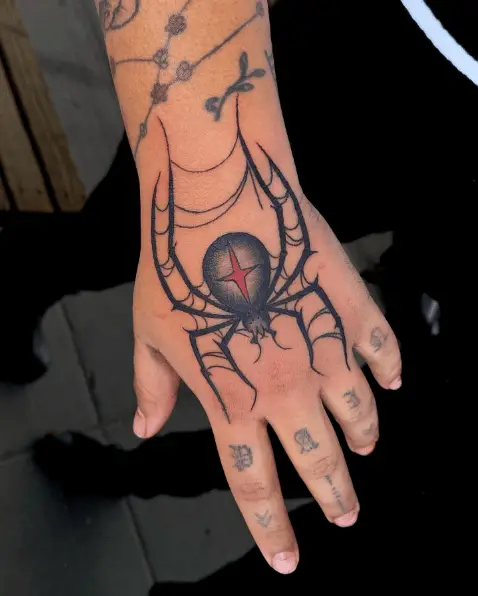 Black Widow Spider Hand Tattoo