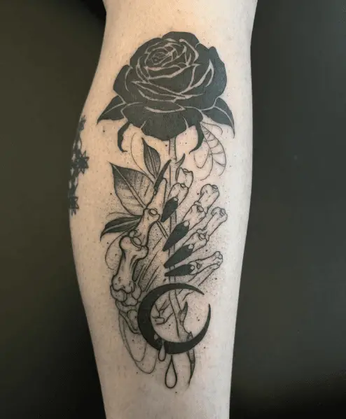 Skeleton Hands Holding Black Rose Tattoo