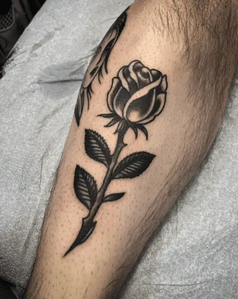 Black and Grey Traditional Rose Tattoo