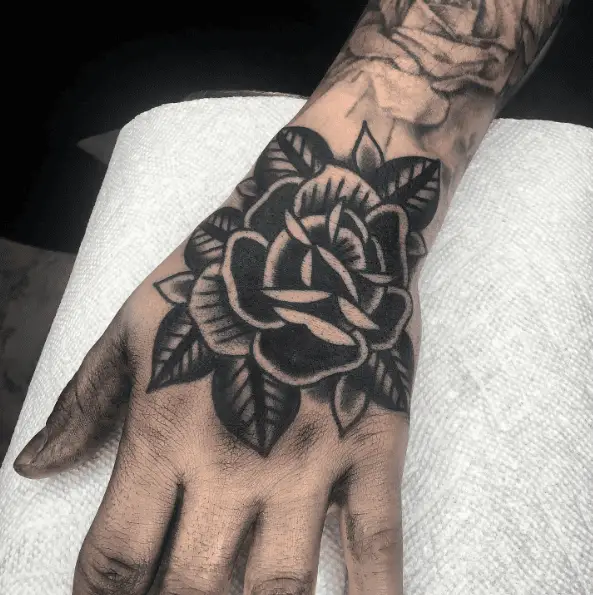 Black and White Traditional Rose Hand Tattoo