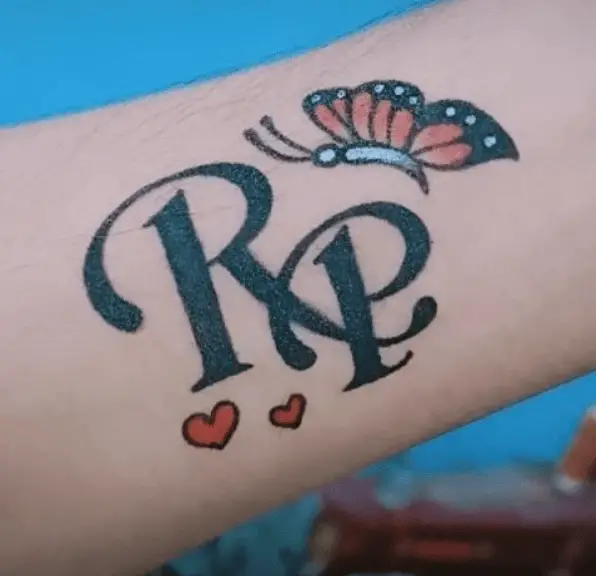 RP Initials with Tiny Hearts and Butterfly Tattoo