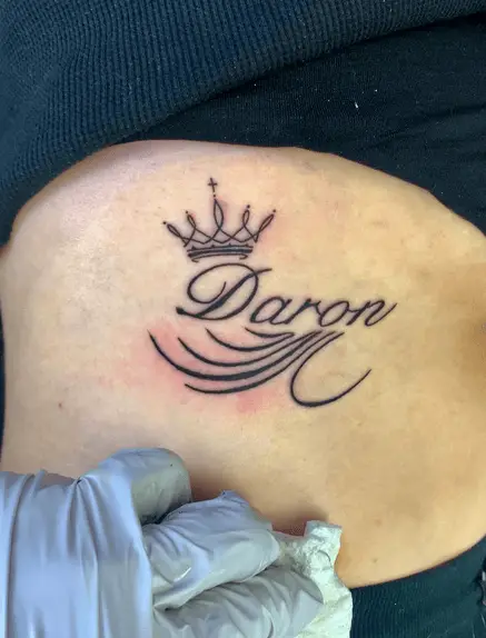 Black Ink Name Tattoo with Crown