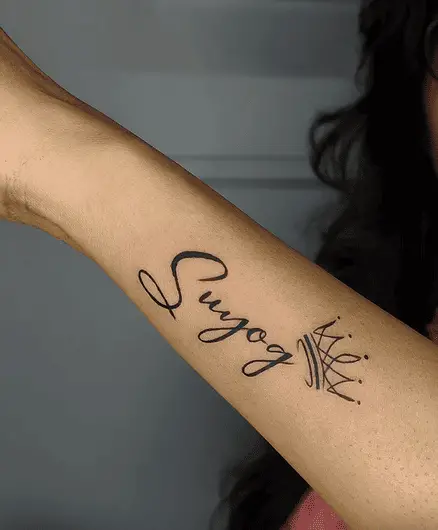 Name with Crown Forearm Tattoo