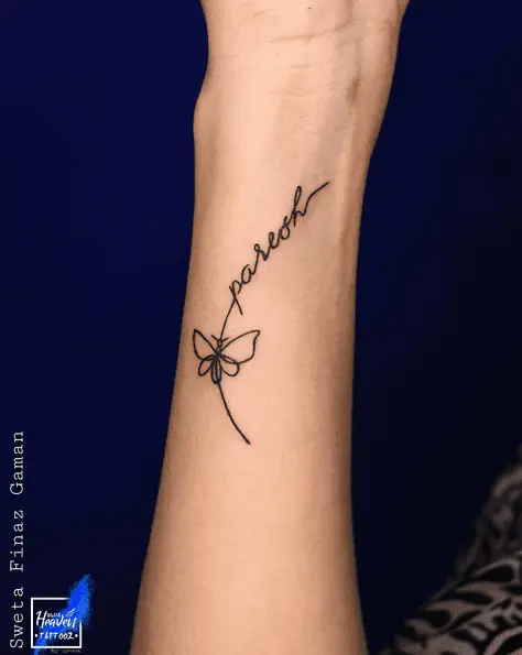 Black Ink Name with Butterfly Wrist Tattoo
