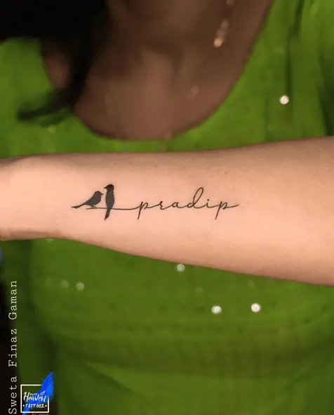 Name with Tiny Crows Forearm Tattoo