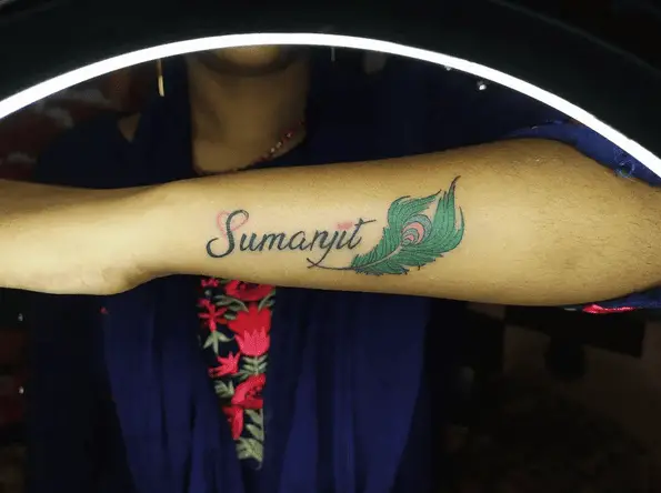 Name with Green Feather Tattoo