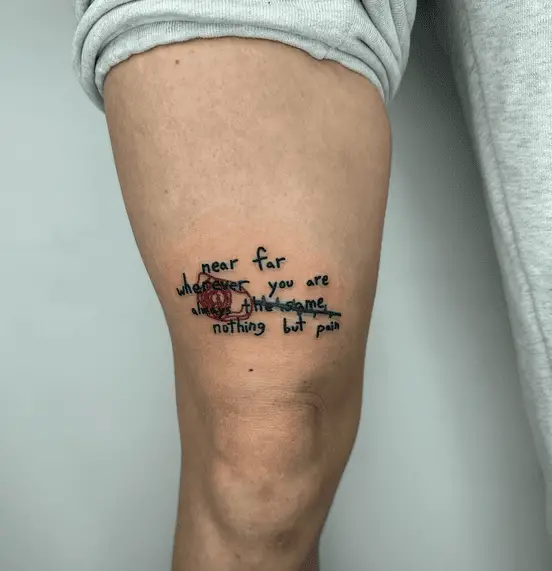 Pain Quote with Single Rose Thigh Tattoo