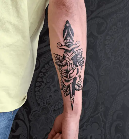 Traditional Style Rose and Dagger Forearm Tattoo