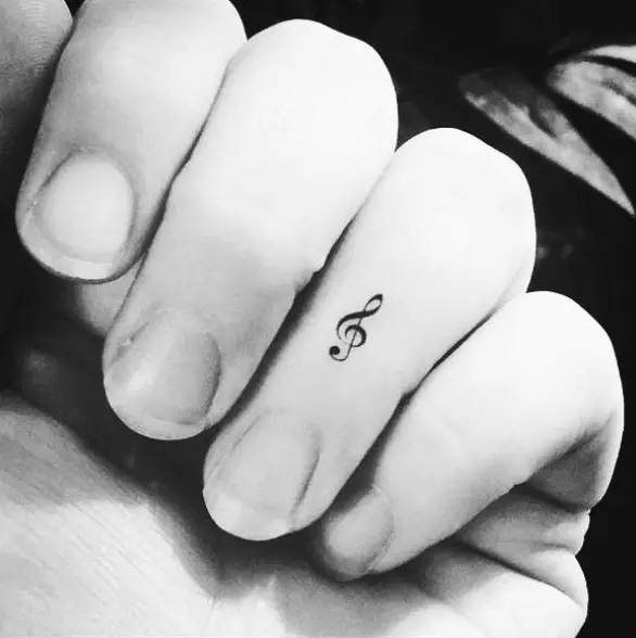 Simple Music Note Finger Tattoo