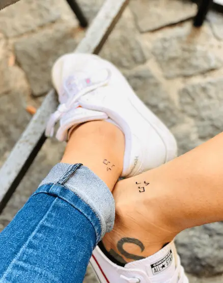 Multiple Music Symbols Ankle Tattoo