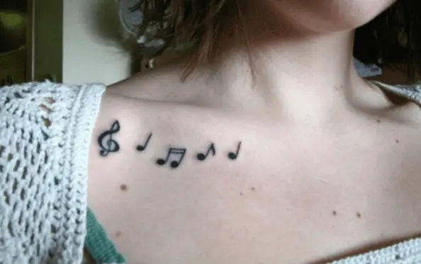 Multiple Music Notes Collarbone Tattoo