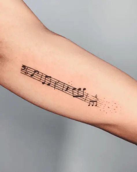 Black Ink Melody Music Note Forearm Tattoo