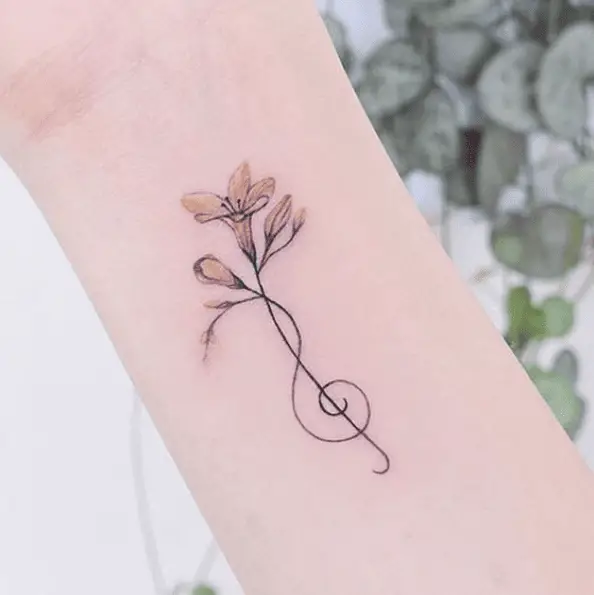Black and Yellow Floral Music Note Tattoo