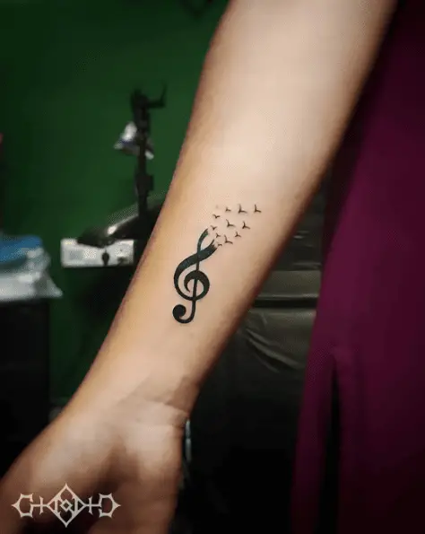 Music Note Symbol with Flying Birds Tattoo