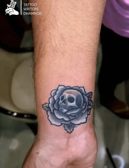 Floral Skull Wrist Coverup Tattoo