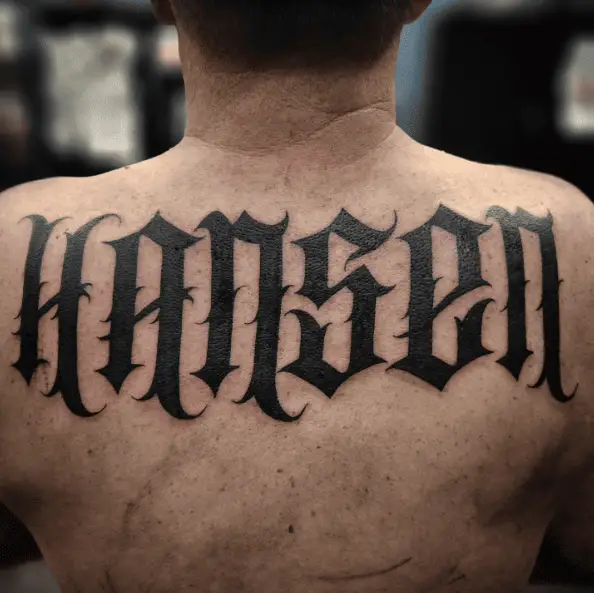 Hansen Gothic Font Last Name Back Tattoo