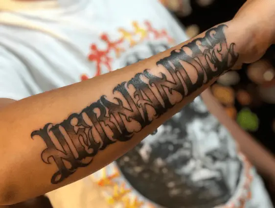 Double Shaded Last Name Text Tattoo