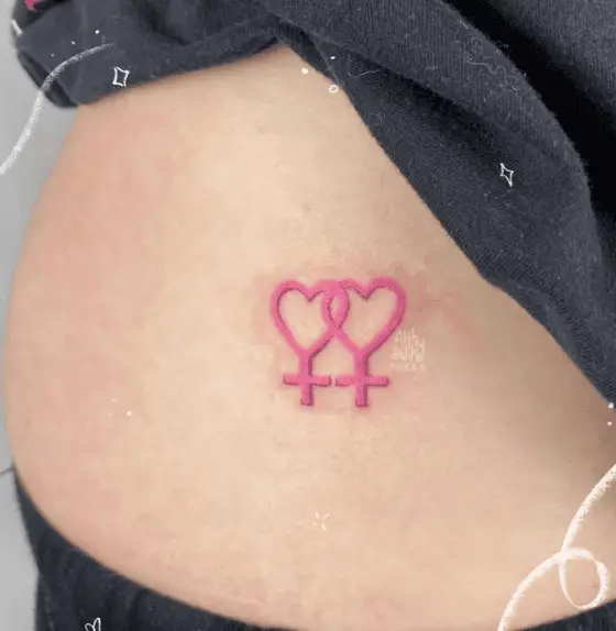 Pink Ink Heart Shaped Double Venus Symbol Tattoo