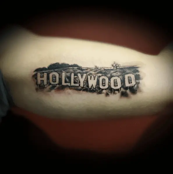 Hollywood Lettering with Landscape Tattoo
